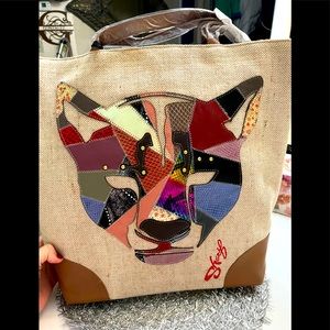 Unique large designer bag with bonus bag